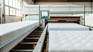 What is the production and delivery timeline for spring mattresses from China?