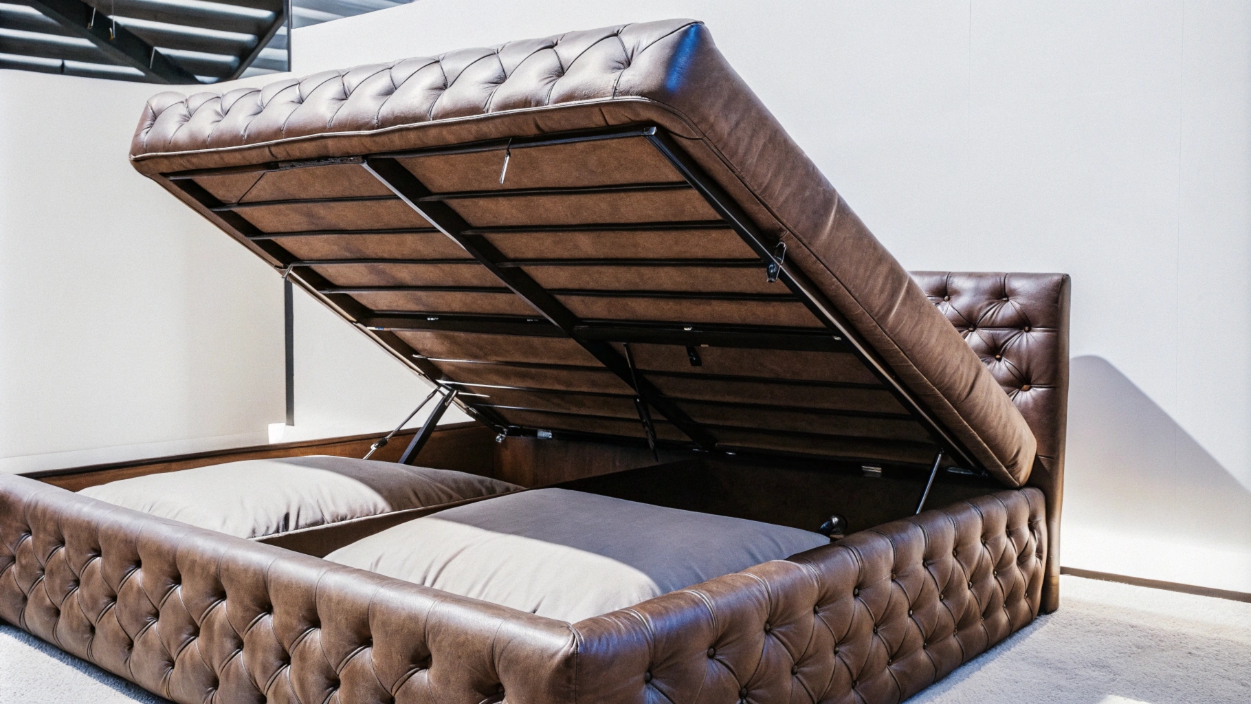 Brown leather upholstered bed with open storage compartment and padded headboard.