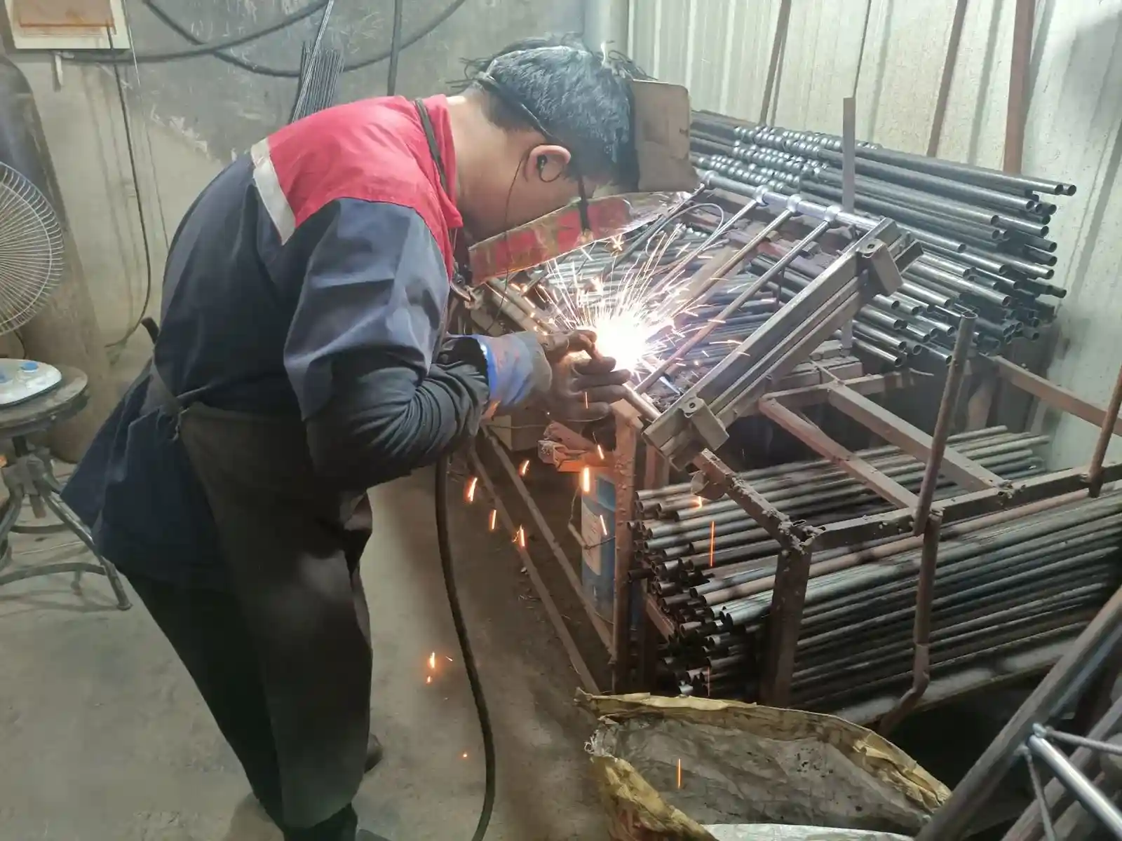 Metal frame welding station