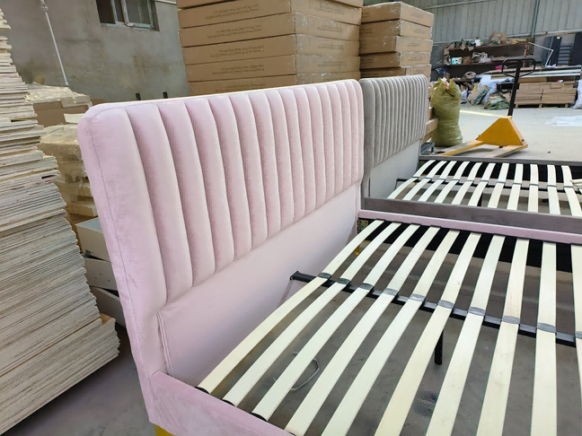 A modern bed frame upholstered in trendy teddy fleece fabric in a stylish bedroom