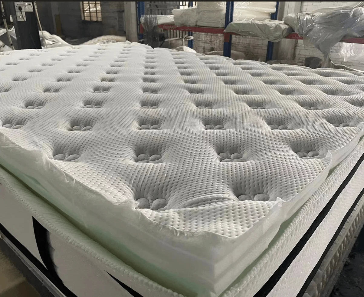 An inside-view cross-section of a mattress showing foam and springs