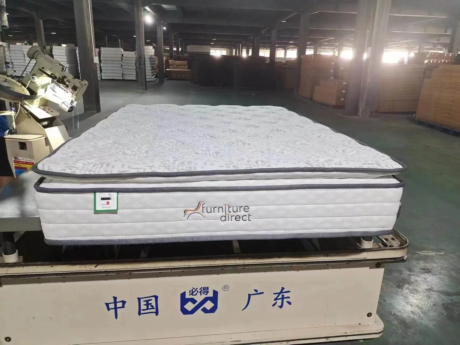 A close-up of a BS 7177 fire safety label on a mattress