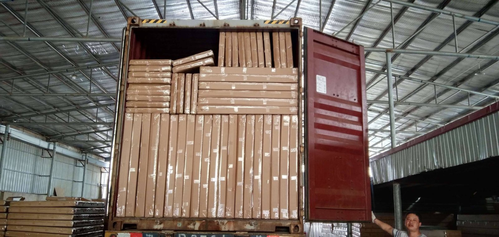 Importing beds from China to Lithuania A container ship with DIKAPABED logo heading towards Lithuania