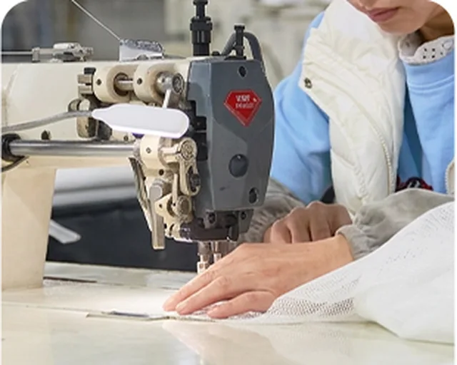 Cover sewing — mattress production photograph